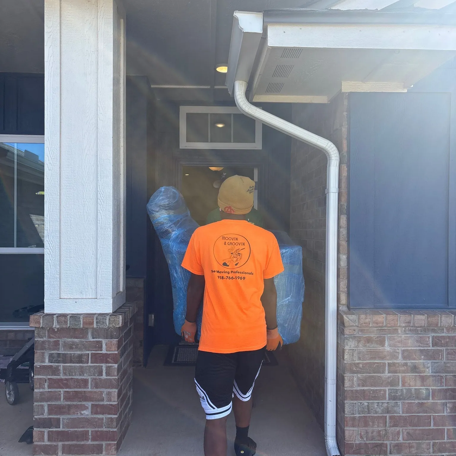 Moovin & Groovin team delivering